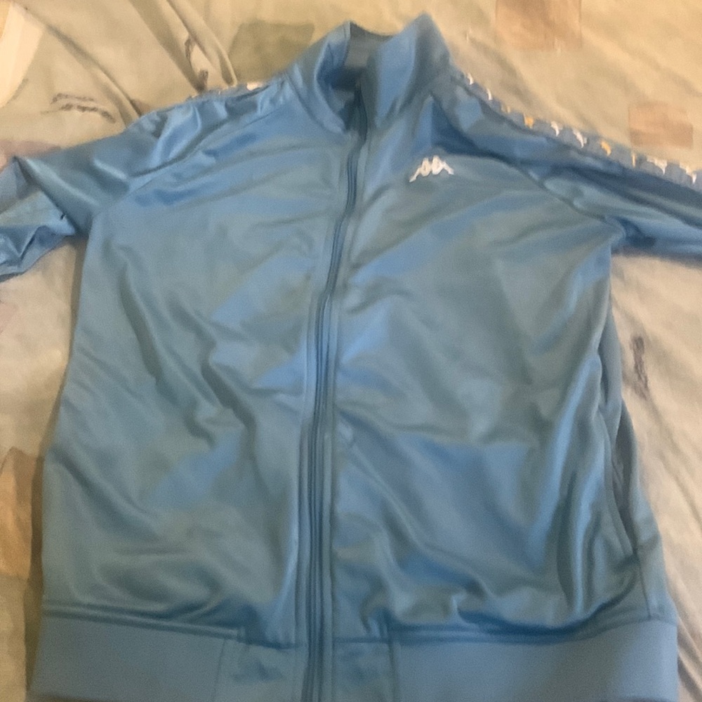 Hey this a kappa jacket that has never been worn